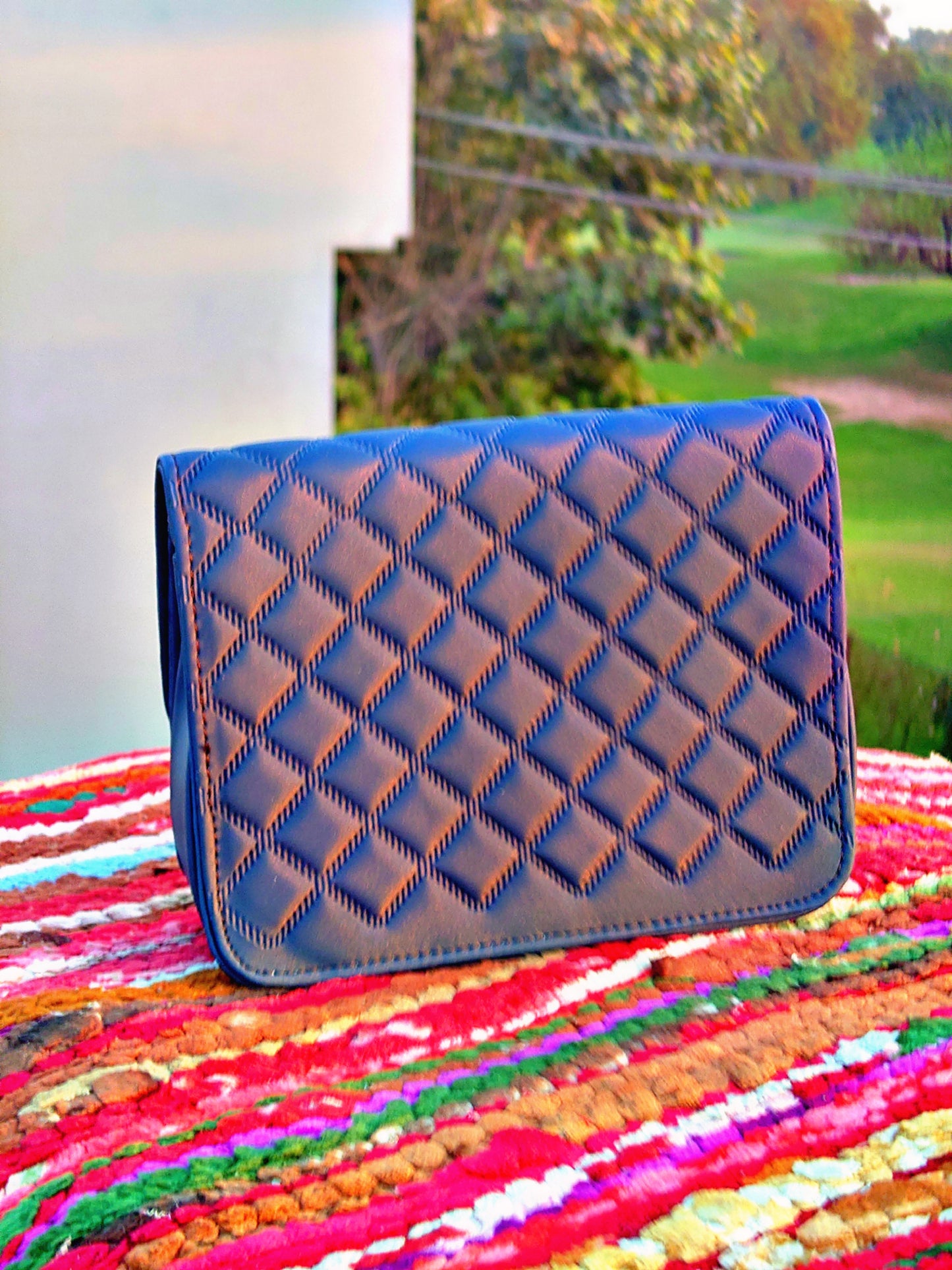 quilted diamond pattern hand bag
