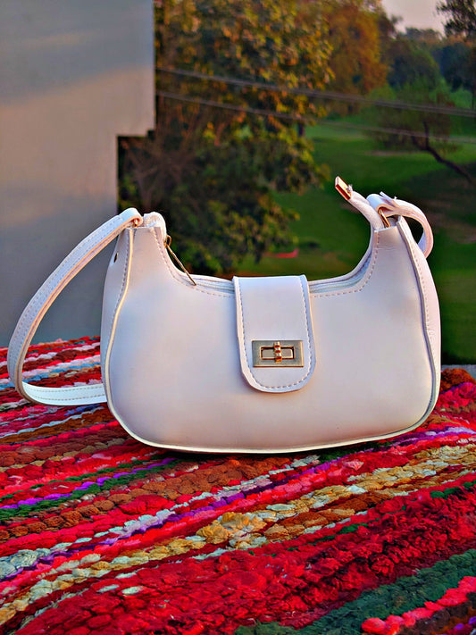 white shoulder hand bag