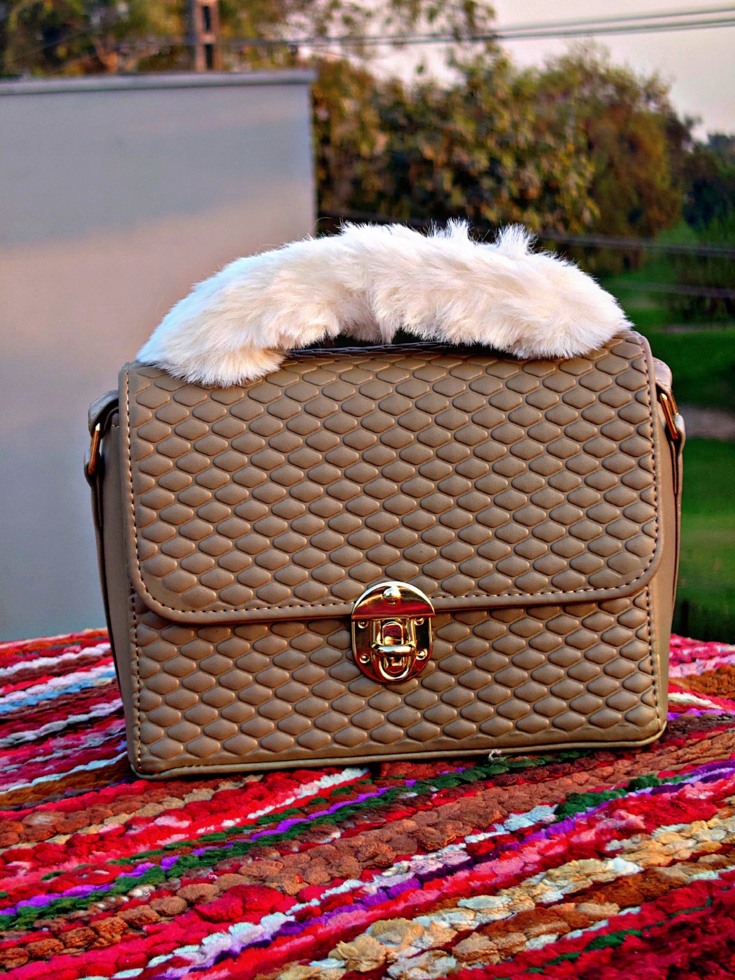 geometric textured hand bag