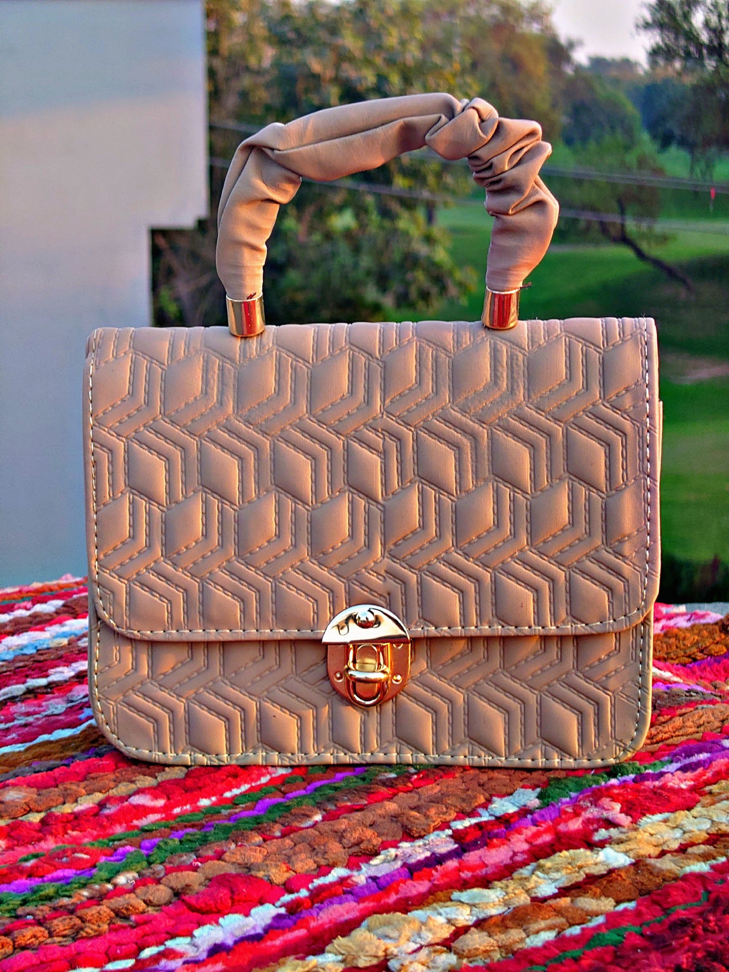 geometric textured hand bag