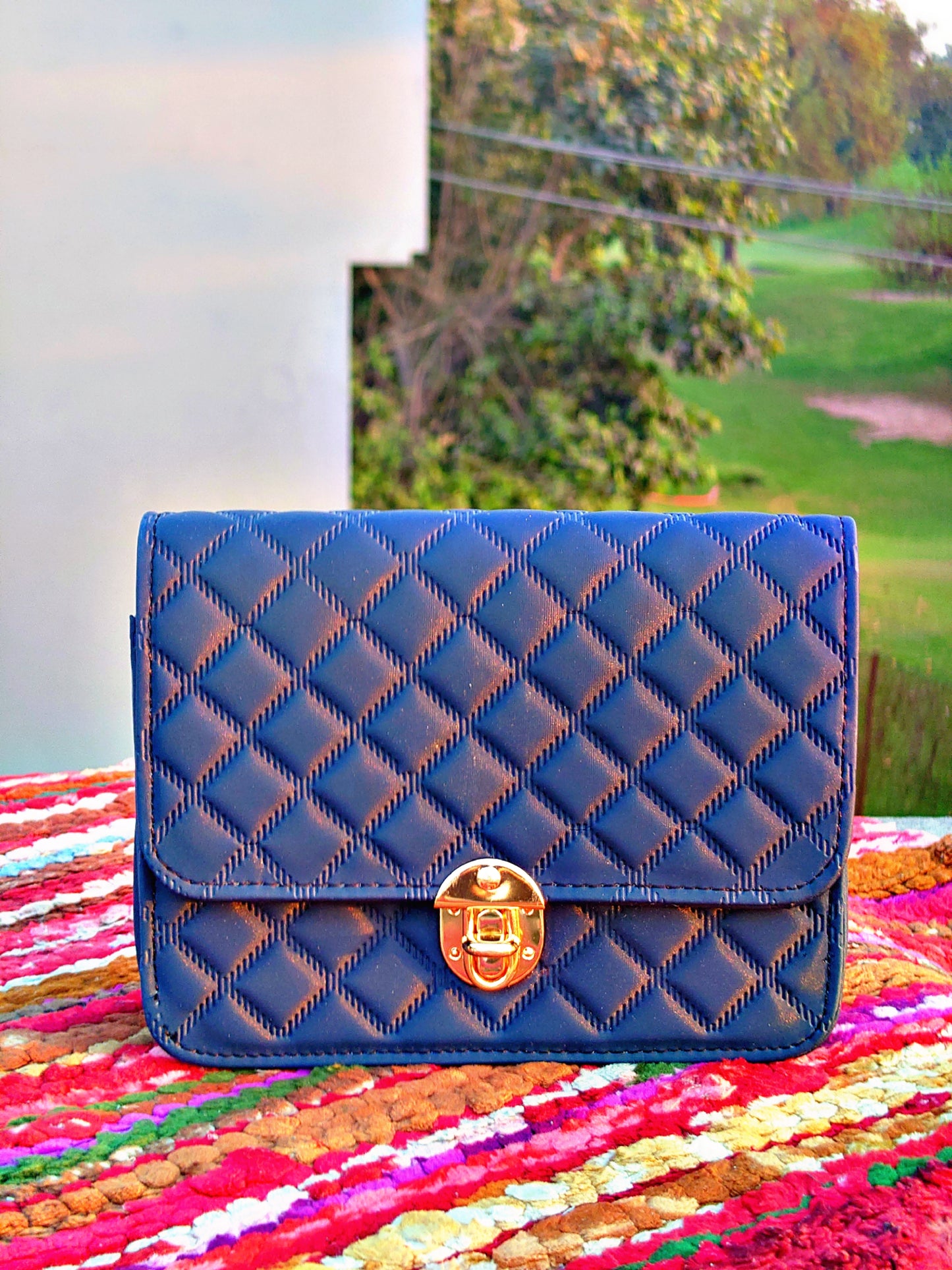 quilted diamond pattern hand bag