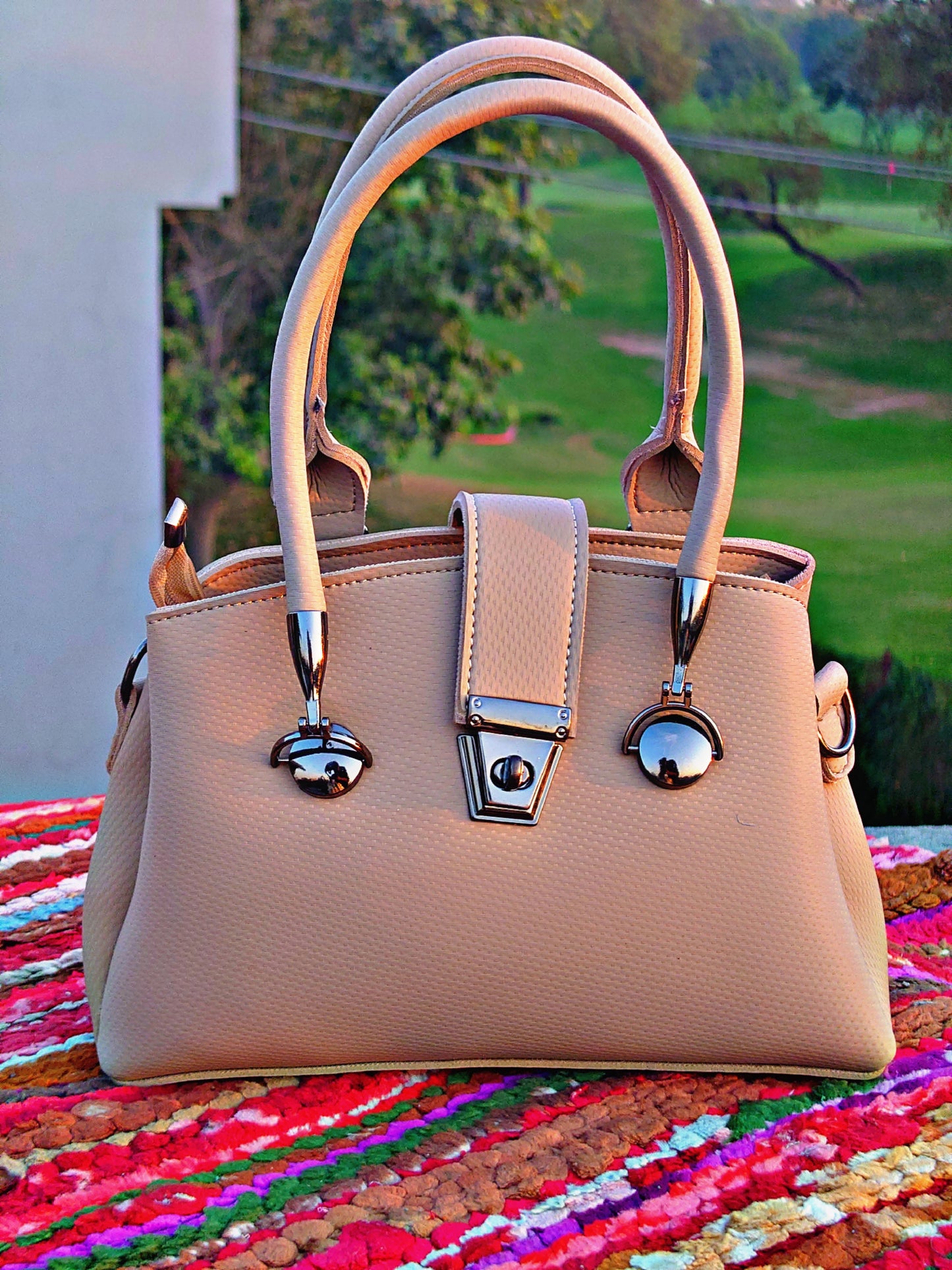 elegant beige textured hand bag